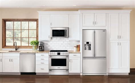 white or stainless steel appliances to match white shaker cabinets|appliance matching cabinets.